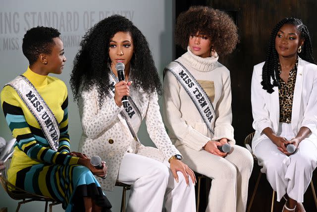 <p>Bryan Bedder/Getty</p> Miss USA 2019 Cheslie Kryst (second from left) with (L-R) Miss Universe Zozibini Tunzi, Miss Teen USA Kaliegh Garris and Miss America 2019 Nia Franklin on Feb. 6, 2020.