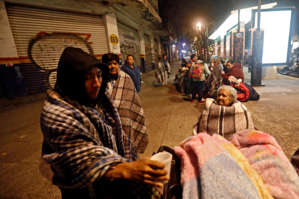 People gather on a street after an earthquake hit Mexico City on September 8.