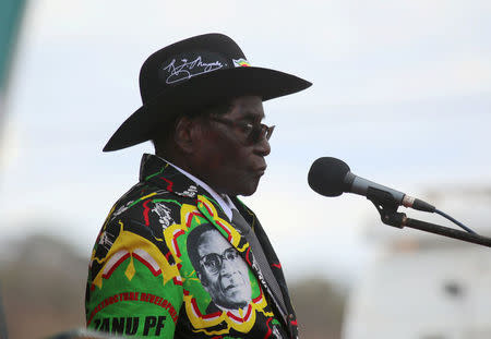 FILE PHOTO: President Robert Mugabe addressed supporters of his ruling ZANU party at a rally in Chinhoyi, Zimbabwe, July 29, 2017. REUTERS/Philimon Bulawayo/File Photo