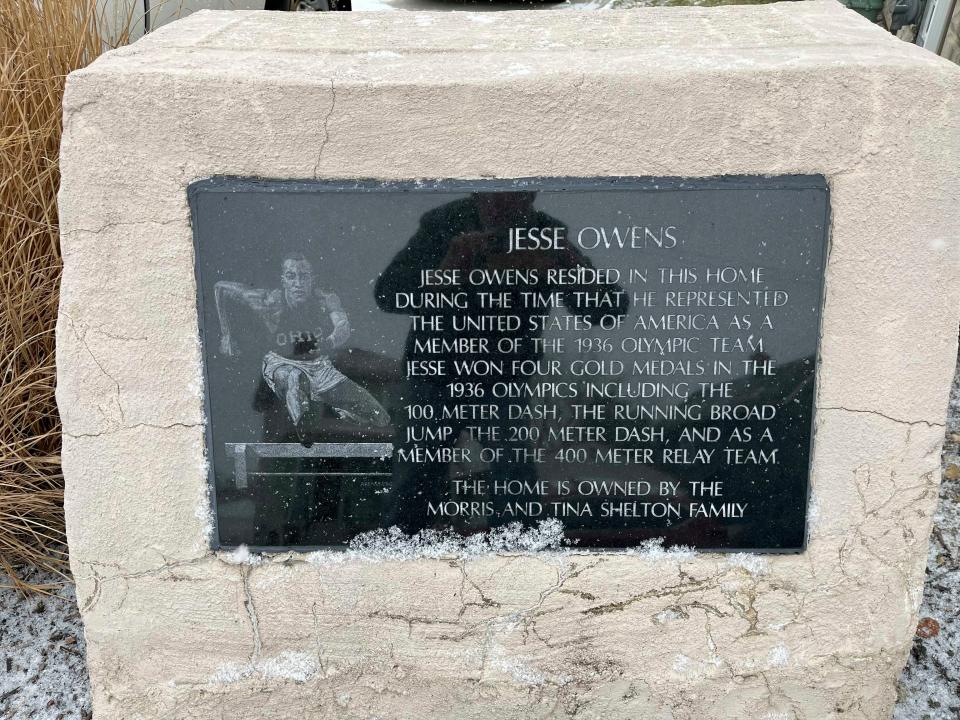 A marker outside the former Hilltop home of track and field legend Jesse Owens.