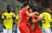 <p>Jordan Henderson holds his face after Wilmar Barrios puts his head where he shouldn’t </p>