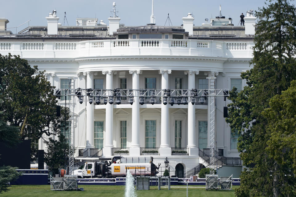 Lights and staging stand on the South Lawn of the White House, Friday, Aug. 21, 2020, in Washington. President Donald Trump is expected to speak to the Republican National Committee convention next week from the South Lawn of the White House. (AP Photo/Patrick Semansky)