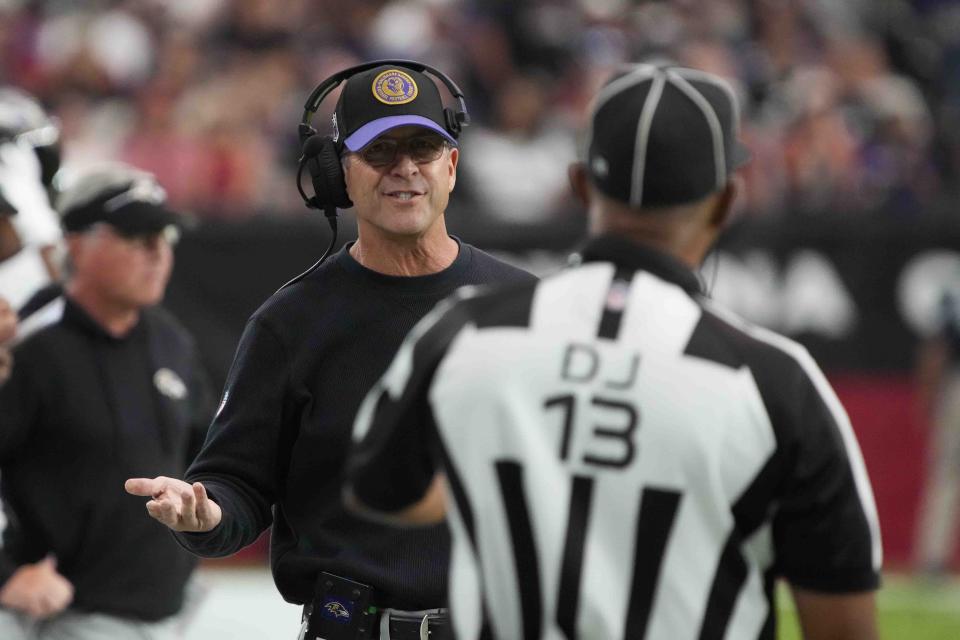 Baltimore Ravens head coach John Harbaugh argues with down judge Patrick Turner during the first half of an NFL football game against the Arizona Cardinals Sunday, Oct. 29, 2023, in Glendale, Ariz. (AP Photo/Rick Scuteri)