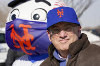 FILE - New York Mets owner Steve Cohen attends a news conference at a COVID-19 vaccination site at Citi Field, the home of the Mets, Feb. 10, 2021, in the Queens borough of New York. Cohen heard that baseball's new luxury tax level was named after him. “It’s better than a bridge being named after you,” the he said Sunday, March 13, 2022, as spring training camp opened after a 25-day delay caused by Major League Baseball's lockout. (AP Photo/Mary Altaffer, File)