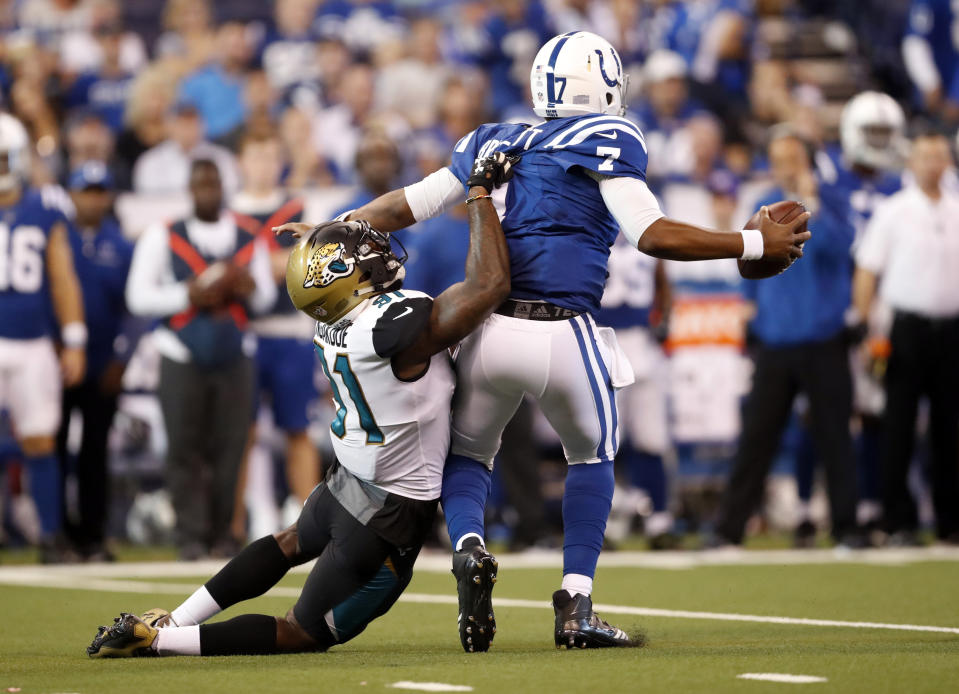 <p>Jacksonville Jaguars defensive end Yannick Ngakoue (91) ties to tackle Indianapolis Colts quarterback Jacoby Brissett (7) during the first half of an NFL football game in Indianapolis, Sunday, Oct. 22, 2017. (AP Photo/Jeff Roberson) </p>