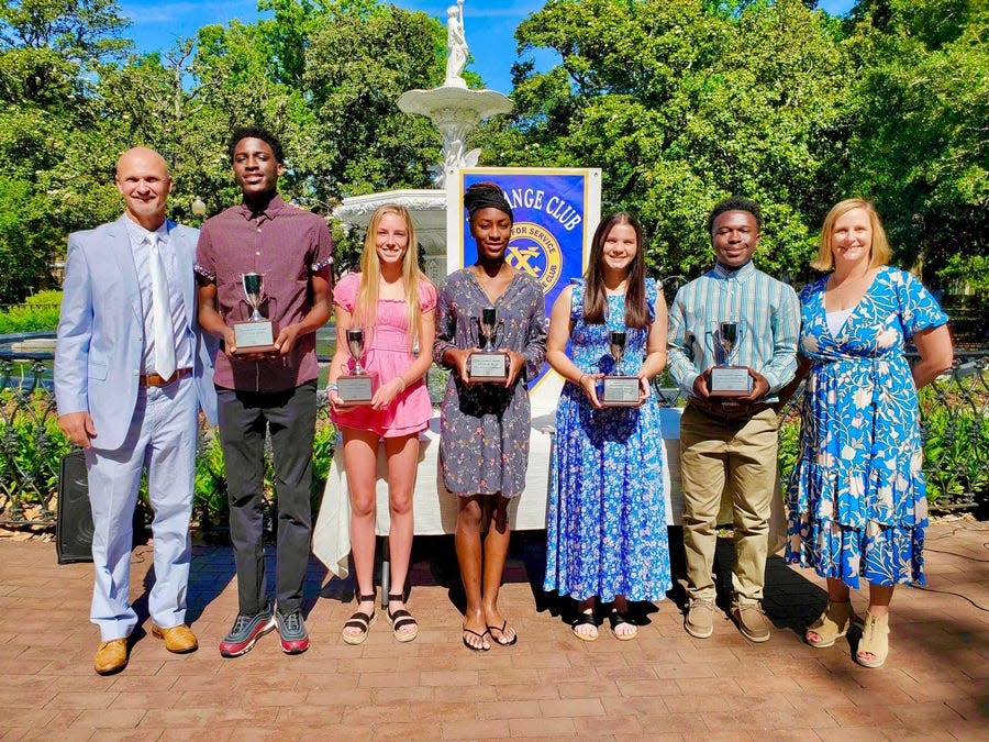 The 2023 Dewitt Award winners (from left to right): David Dewitt, Ca'ron Hall, Grace Dare, Mariah Reid, Madison Bueno, James H. Mobley IV and Elizabeth Reid Dewitt.