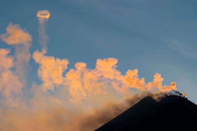 <p>Salvatore Cavalli/SOPA Images/LightRocket via Getty</p> Etna's "smoke rings" on April 6