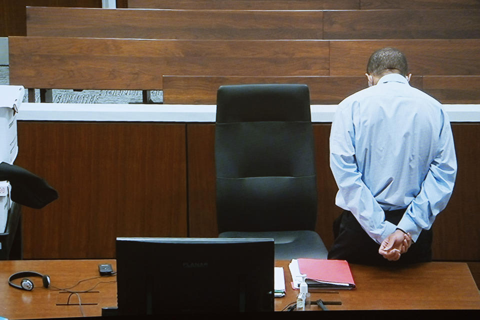 Darrell Brooks appears via video from an adjacent courtroom due to his continuous interruptions during his trial in Waukesha County Circuit Court on Tuesday, Oct. 25, 2022, in Waukesha, Wis. Brooks, who is representing himself during the trial, is charged with driving into a Waukesha Christmas Parade last year, killing six people and injuring dozens more. (Mark Hoffman/Milwaukee Journal-Sentinel via AP, Pool)