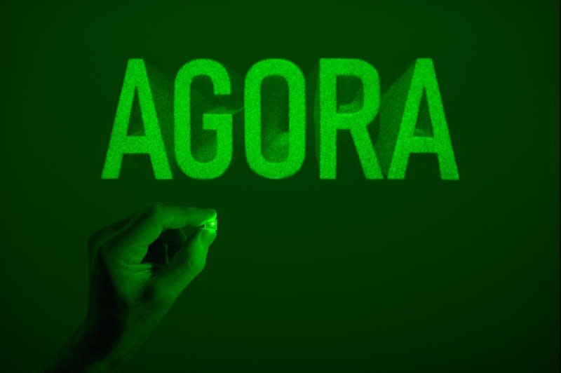 Eduardo Kac has been trying for 37 years to realize his vision for an art project that involves sending his work into deep space. The hologram specifically shows the Portuguese word 'Ágora,' which means 'now.' Photo courtesy of Eduardo Kac