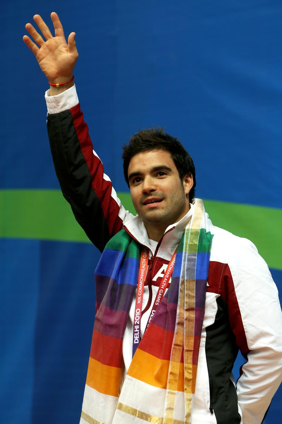 DELHI, INDIA - OCTOBER 11: Alexandre Despatie of Canada poses with the gold medal won in the Men's 3m Springboard Final at Dr. S.P. Mukherjee Aquatics Complex during day eight of the Delhi 2010 Commonwealth Games on October 11, 2010 in Delhi, India. (Photo by Phil Walter/Getty Images)