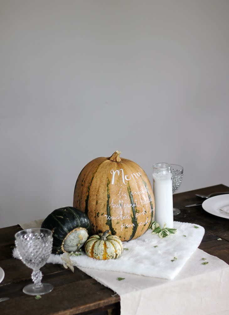 <p>Ditch the paper menus, and put the evening's meal lineup right on a gourd.</p><p><strong>Get the tutorial at <a rel="nofollow noopener" href="http://themerrythought.com/diy/diy-menu-pumpkin/" target="_blank" data-ylk="slk:The Merry Thought;elm:context_link;itc:0;sec:content-canvas" class="link ">The Merry Thought</a>.</strong></p><p><strong>RELATED:</strong> <a rel="nofollow noopener" href="https://www.womansday.com/life/g2618/fall-activities-for-families/" target="_blank" data-ylk="slk:Fall Activities Every Family Should Do This Season;elm:context_link;itc:0;sec:content-canvas" class="link ">Fall Activities Every Family Should Do This Season</a></p>