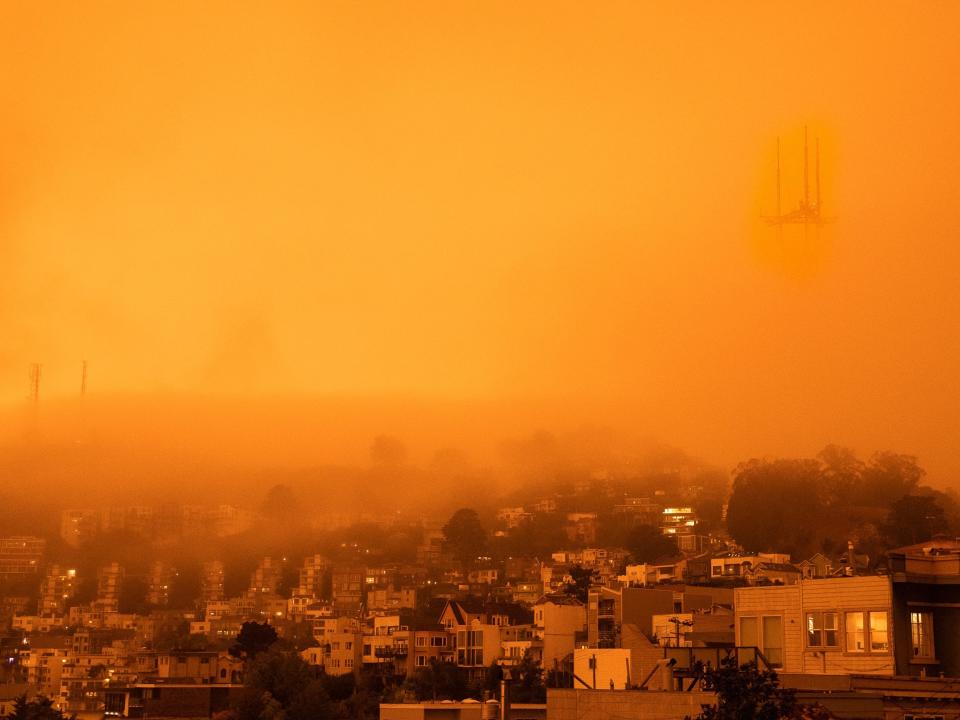 San Francisco is seen with orange skies during wildfires