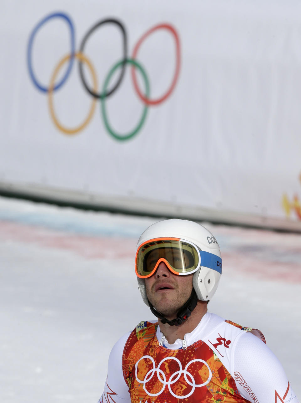 United States' Bode Miller looks up from the finish area after finishing the men's downhill at the Sochi 2014 Winter Olympics, Sunday, Feb. 9, 2014, in Krasnaya Polyana, Russia. (AP Photo/Gero Breloer)