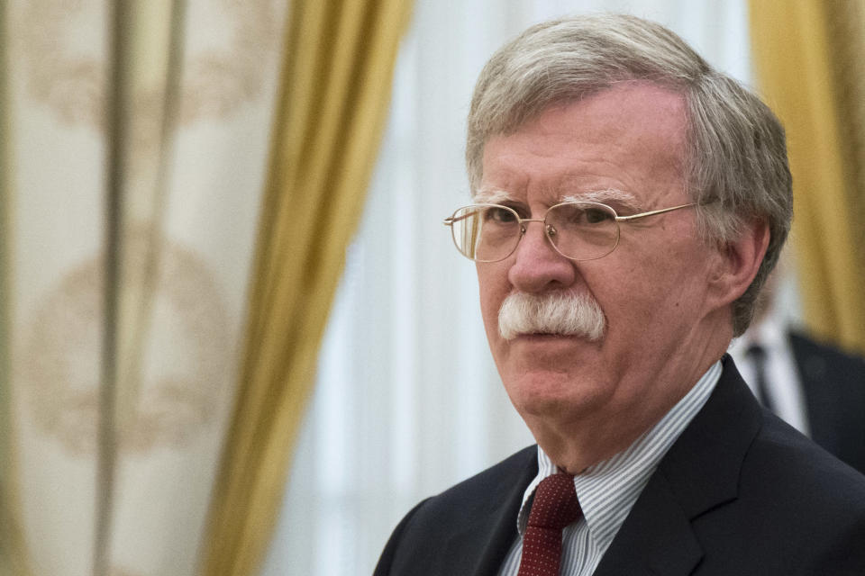 FILE - In this Wednesday, June 27, 2018 file photo, U.S. National security adviser John Bolton waits for the talks with Russian President Vladimir Putin in the Kremlin in Moscow, Russia. President Donald Trump’s national security adviser is going to be raising thorny subjects with his counterparts in Moscow on a visit to help craft a script for another high-level meeting between Trump and Russia President Vladimir Putin. John Bolton leaves Saturday, Oct. 20, 2018 on a trip to Russia, Azerbaijan, Armenia and Georgia. (AP Photo/Alexander Zemlianichenko, Pool)