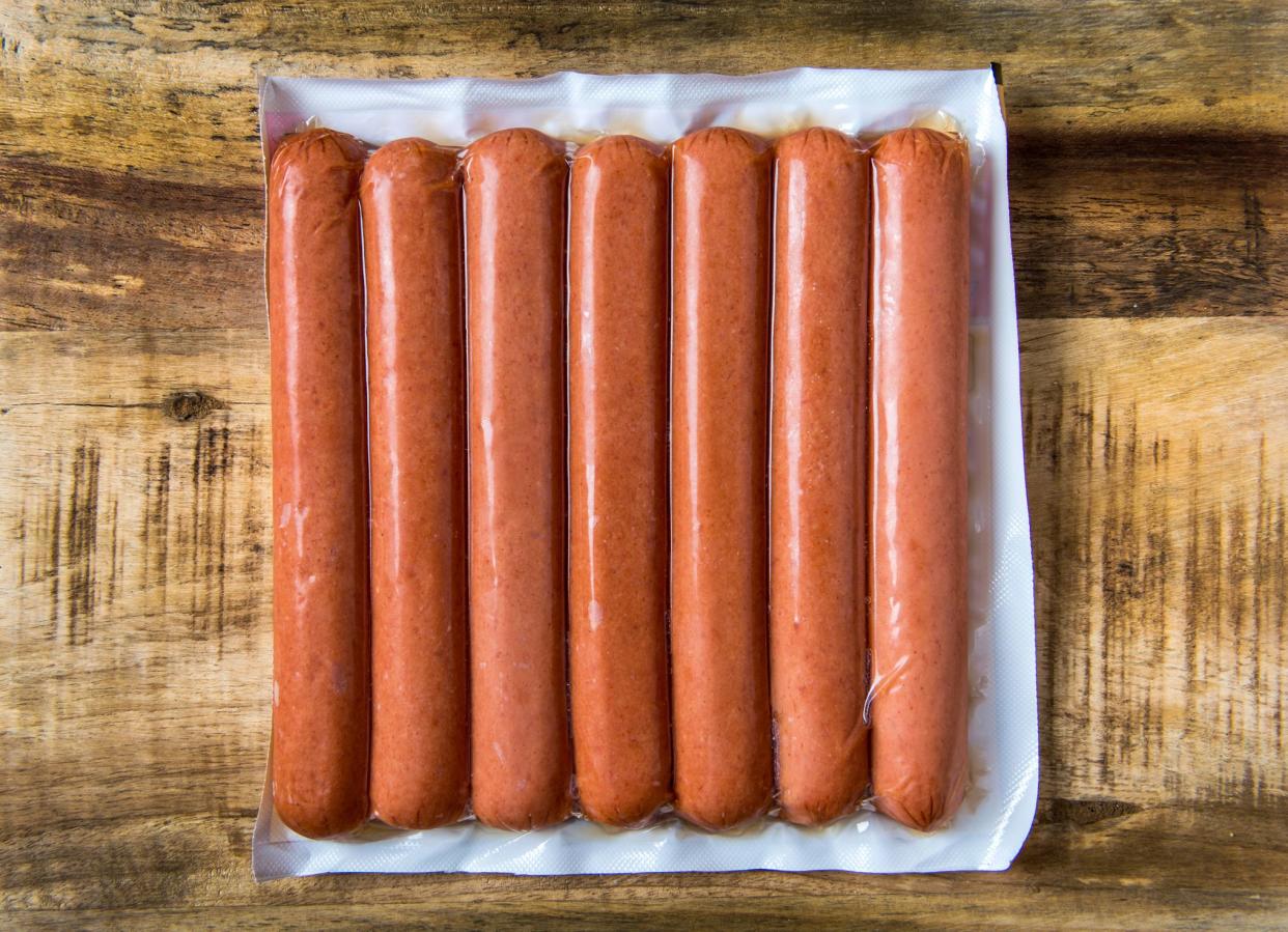 Plain vacuum sealed package of hotdog sausages from above