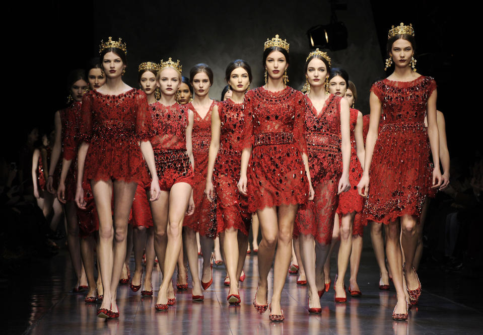 Models wear creations for Dolce & Gabbana women's Fall-Winter 2013-14 collection, part of the Milan Fashion Week, unveiled in Milan, Italy, Sunday, Feb. 24, 2013. (AP Photo/Giuseppe Aresu)