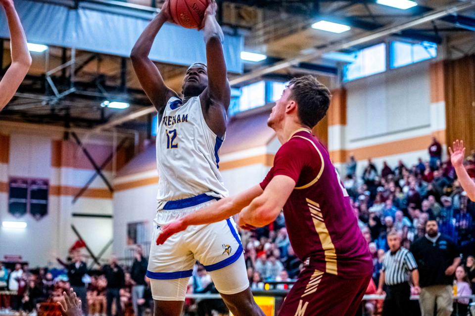 Wareham's Antoine Crosson attacks the basket.