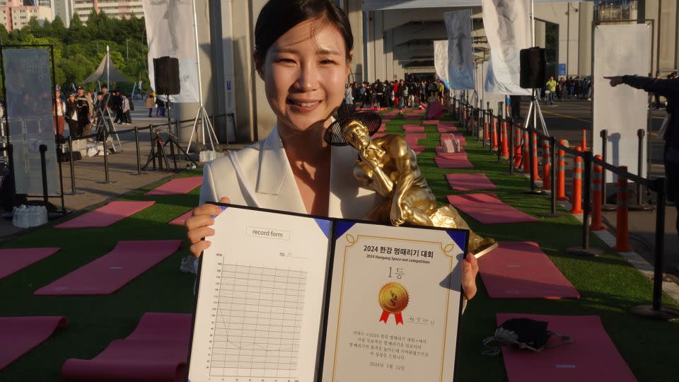 Freelance announcer Kwon So-a won this year's competition in Seoul and took home a trophy shaped like Auguste Rodin's sculpture "The Thinker." - Charlie Miller/CNN