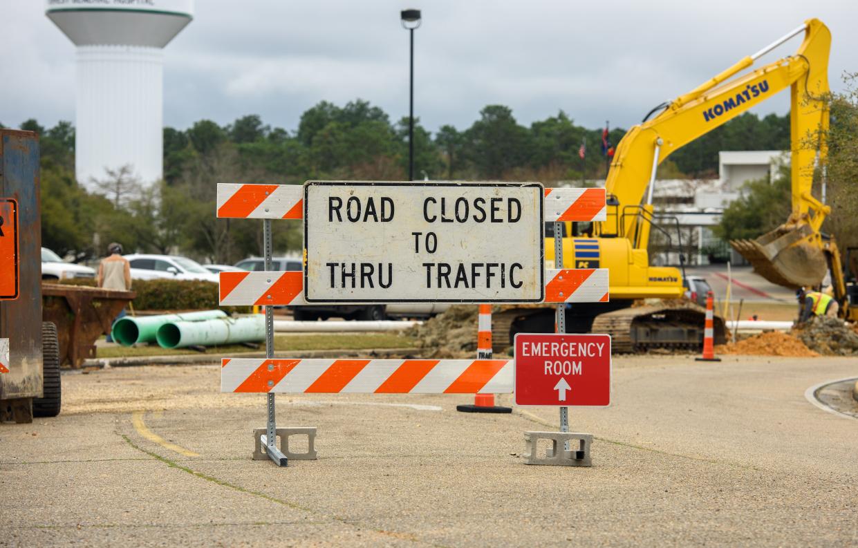 Signs and construction crews restrict some access to the emergency room at Forrest County General Hospital in Hattiesburg, Miss., Wednesday, March 16, 2022.