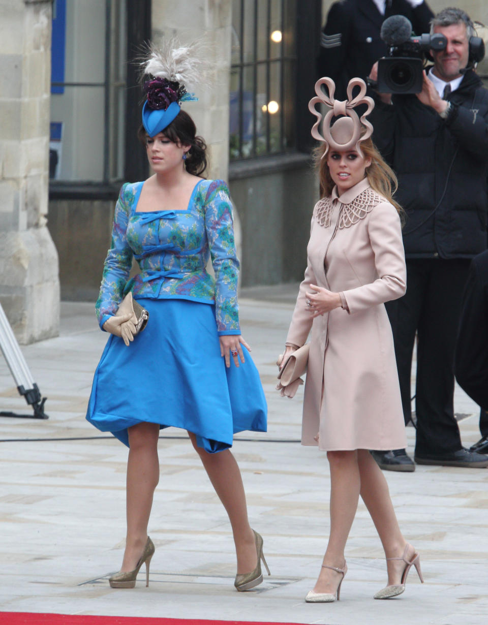 LONDON, ENGLAND - APRIL 29:  Princess Beatrice of York and Princess Eugenie of York arrive to attend the Royal Wedding of Prince William to Catherine Middleton at Westminster Abbey on April 29, 2011 in London, England. The marriage of the second in line to the British throne is to be led by the Archbishop of Canterbury and will be attended by 1900 guests, including foreign Royal family members and heads of state. Thousands of well-wishers from around the world have also flocked to London to witness the spectacle and pageantry of the Royal Wedding.  (Photo by Mike Marsland/WireImage)