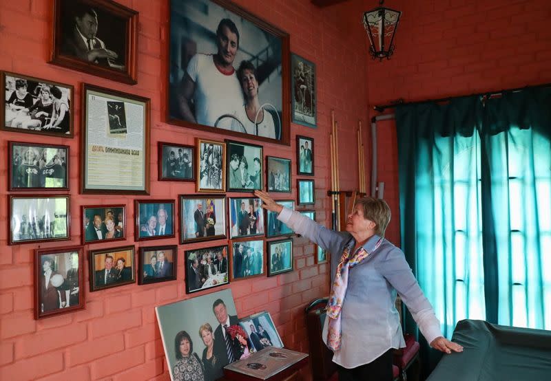 Legendary Soviet gymnast Larisa Latynina, holder of the record for the most Olympic gold medals by a gymnast shows her pictures in home, in village Kalyanino