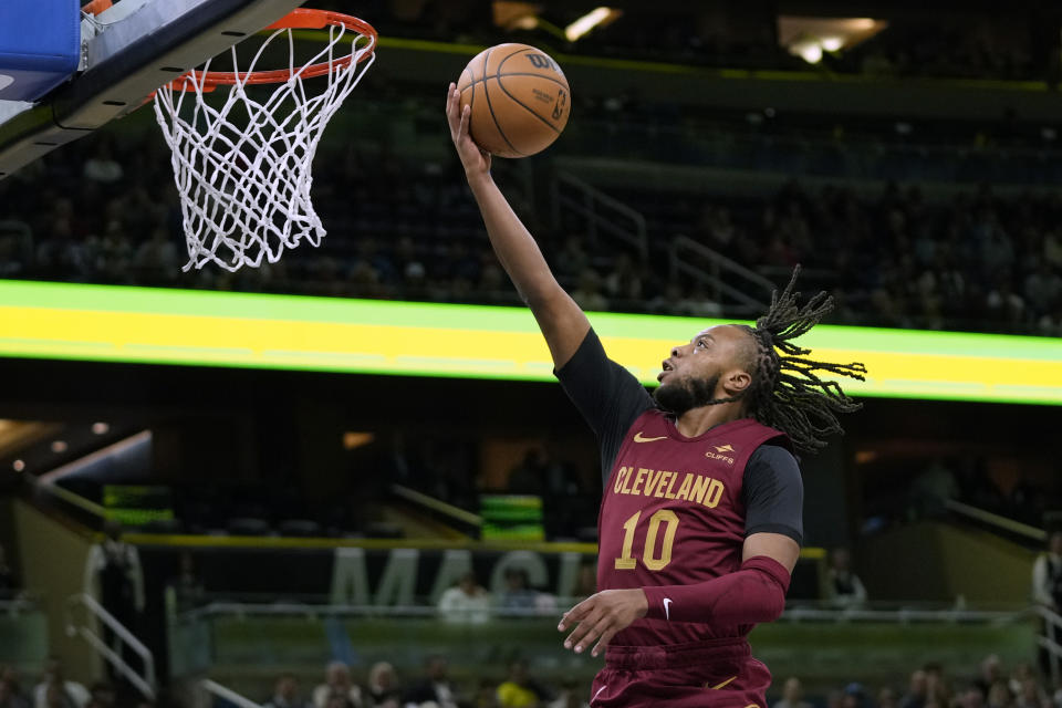 Cleveland Cavaliers guard Darius Garland (10) makes an uncontested layup on a fast break during the first half of an NBA basketball game against the Orlando Magic, Monday, Dec. 11, 2023, in Orlando, Fla. (AP Photo/John Raoux)