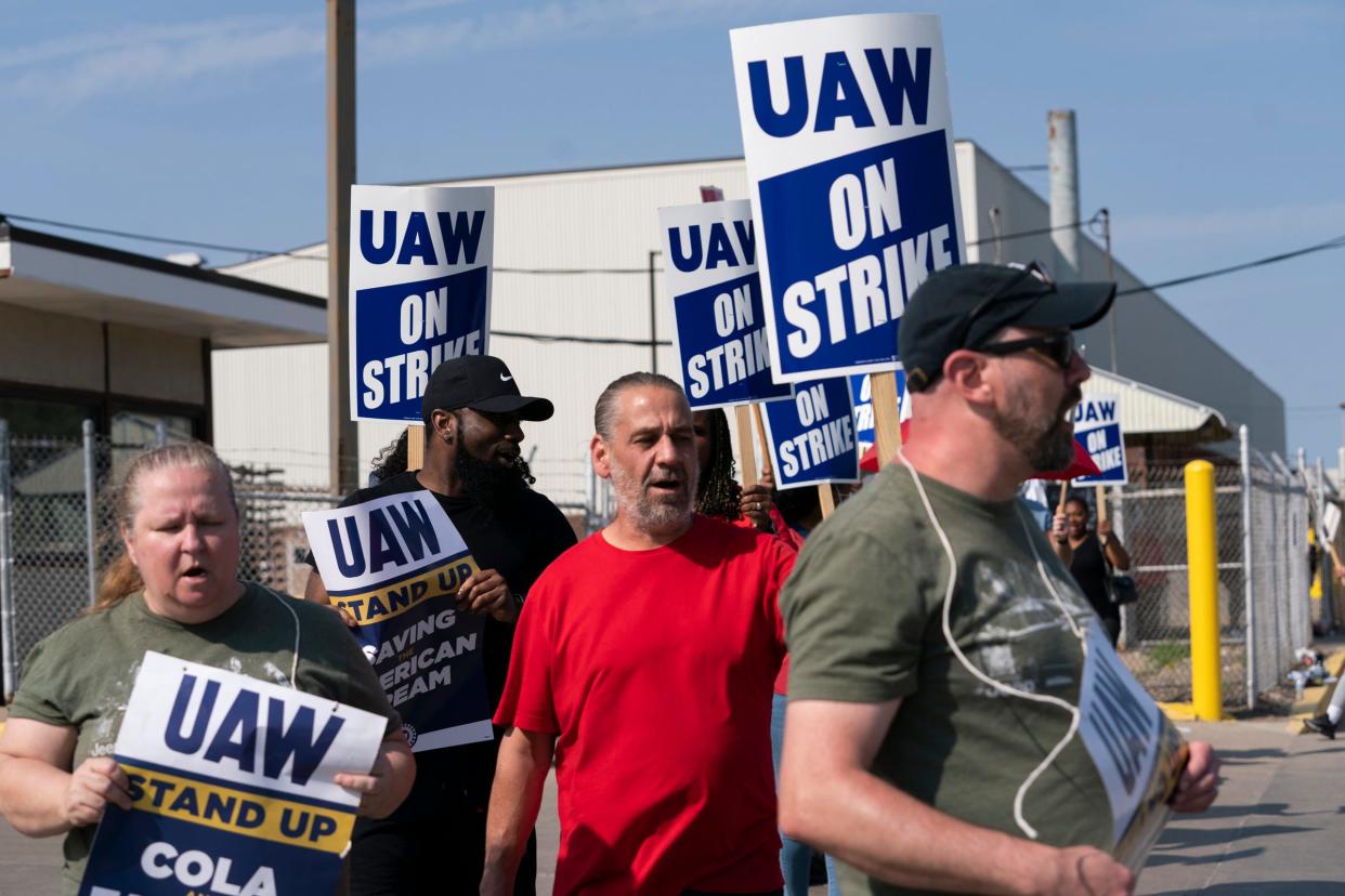 Strikers walk out at noon from 38 GM, Stellantis parts including Sherwood Mopar Parts Distribution Center in Warren after UAW President Shawn Fain called for more shops to go out on strike Friday, Sept. 22, 2023.