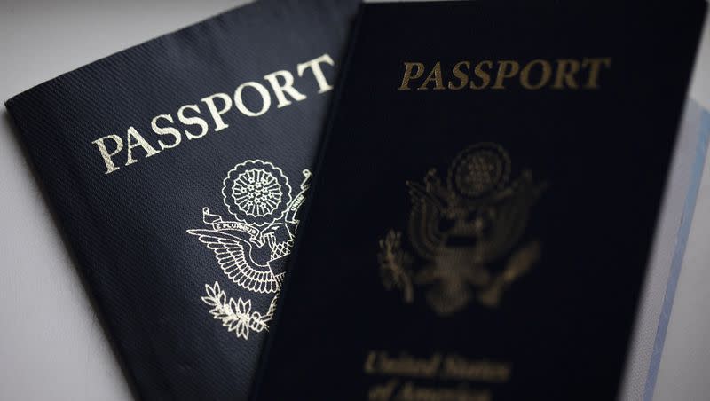 The cover of a U.S. passport is displayed in Tigard, Ore., Saturday, Dec. 11, 2021.