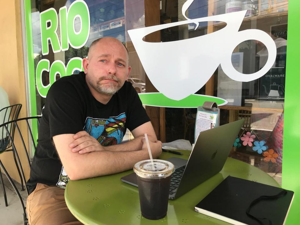 Alex Pagliuca, 46, of Sebastian, sat outside a cafe in downtown Vero Beach on Friday, September 22, 2023, and said he felt greater access to high-speed rail from Orlando to Miami was a good thing and he would like to see a station for passengers on the Treasure Coast.