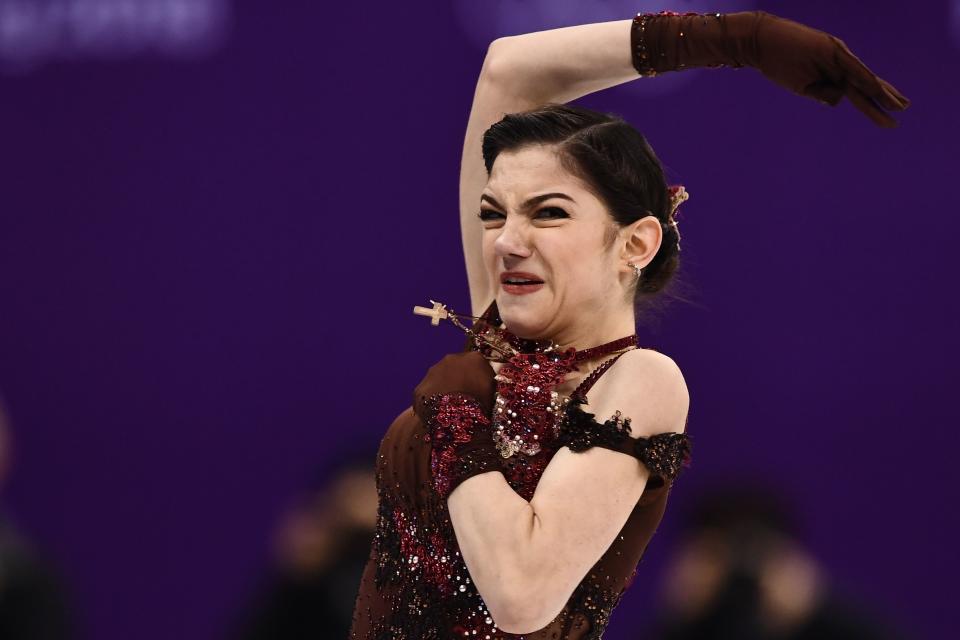 <p>Russia’s Evgenia Medvedeva competes in the women’s single skating free skating of the figure skating event during the Pyeongchang 2018 Winter Olympic Games at the Gangneung Ice Arena in Gangneung on February 23, 2018. / AFP PHOTO / ARIS MESSINIS </p>