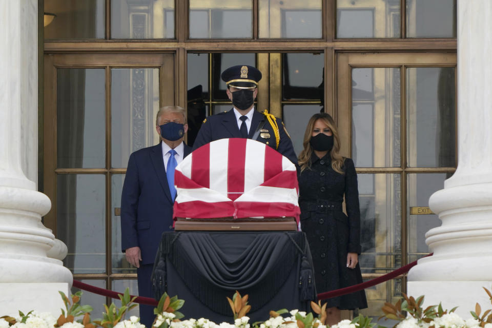 President Donald Trump and first lady Melania Trump pay respects as Justice Ruth Bader Ginsburg lies in repose at the Supreme Court building on Thursday, Sept. 24, 2020, in Washington. Ginsburg, 87, died of cancer on Sept. 18. (AP Photo/J. Scott Applewhite)