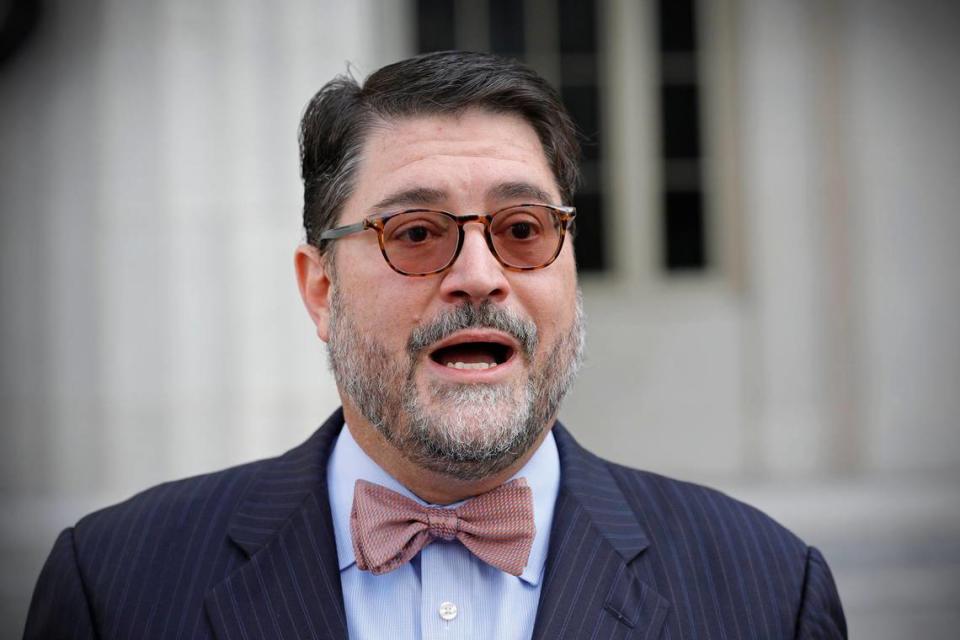 Miami elections attorney Juan-Carlos Planas addresses reporters outside Miami-Dade County Courthouse on Tuesday, March 10, 2020.