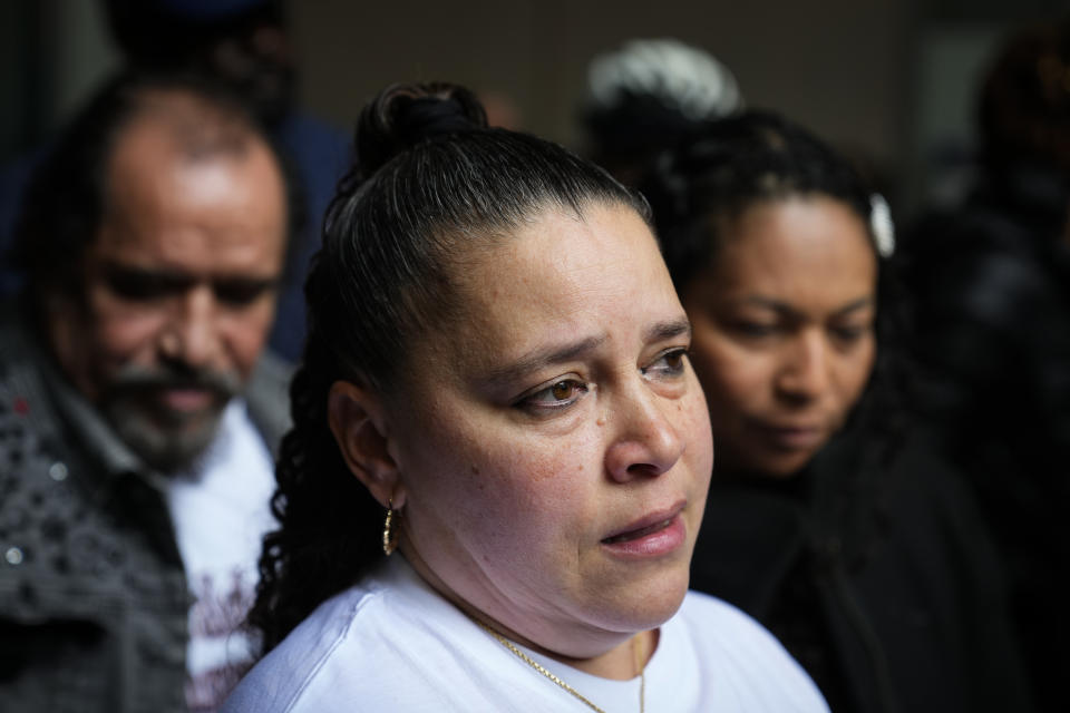 Eddie Irizarry's aunt Ana Cintron speaks with members of the media after a judge has reinstated all charges, including a murder count, against former police officer Mark Dial, in Philadelphia, Wednesday, Oct. 25, 2023. Dial on Aug. 14, shot and killed Irizarry during a during a traffic stop. (AP Photo/Matt Rourke)