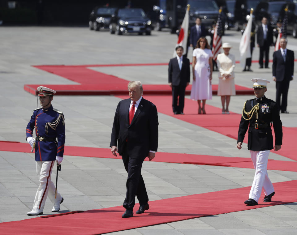 President Donald Trump , front center, participates in a welcome ceremony at the Imperial Palace, Monday, May 27, 2019, in Tokyo. (AP Photo/Evan Vucci)