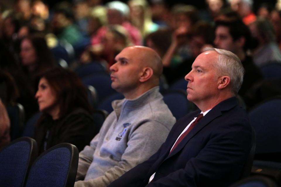 Rye Neck Superintendent Eric Lutinski, right, and Assistant Principal Jason Doerr listen to a presentation about the language and symbols of hate by Steven Goldberg, Director of Education of the Holocaust & Human Rights Education Center, at Rye Neck High School Jan. 24, 2024 in Mamaroneck.