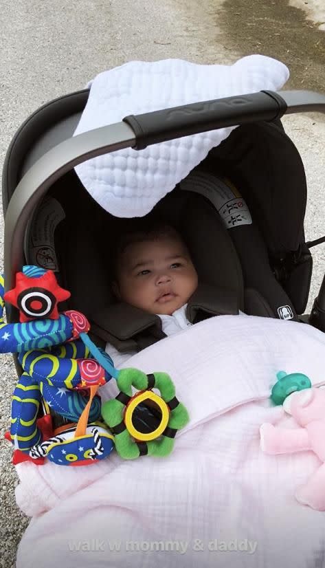 One photo showed the 20-year-old's daughter slightly bleary-eyed, but still as adorable ever looking up at her doting parents. Source: Instagram / kyliejenner