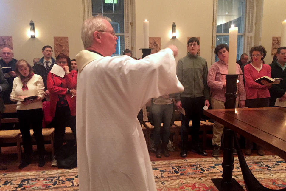 A prayer vigil for a Syrian family whose arrival in the U.S. had been blocked