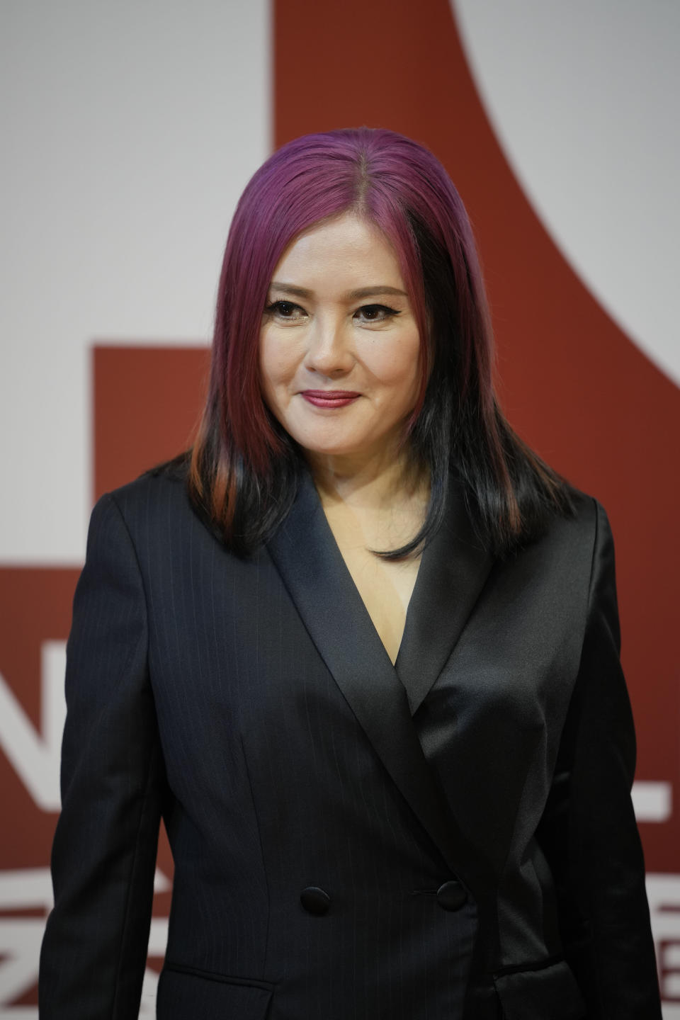 Hong Kong actress Lolrtta Lee poses on the red carpet at the Hong Kong Film Awards, Sunday, July 17, 2022. (AP Photo/Kin Cheung)