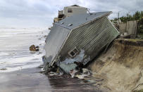 <p><strong>Ponte Vedra Beach</strong><br>A house slides into the Atlantic Ocean in the aftermath of Hurricane Irma in Ponte Vedra Beach, Fla., Sept. 11, 2017. (Photo: Gary Lloyd McCullough/The Florida Times-Union via AP) </p>