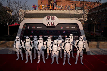 Actors dressed as storm troopers arrive for the China premiere of 'Star Wars: The Last Jedi' at the Shanghai Disney Resort in Shanghai, China, December 20, 2017. REUTERS/Aly Song