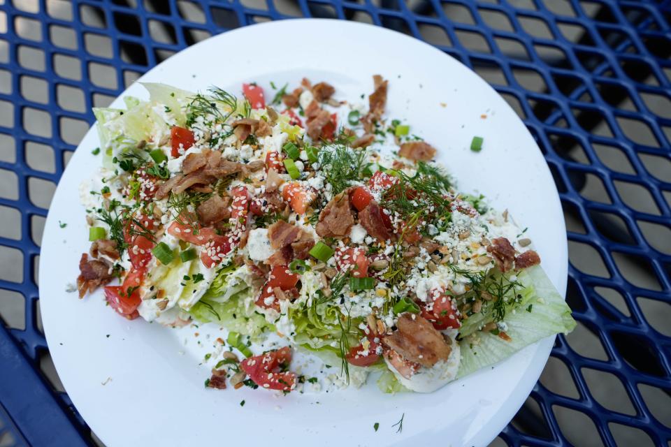 Wandering Monsters Brewery opened in Anderson Township. The brewery features beer, a kitchen, outdoor patio and duckpin bowling. Pictured here is the wedge salad.