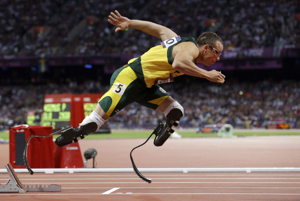 FILE - In this Sunday, Aug. 5, 2012 file photo South Africa's Oscar Pistorius starts in the men's semi-finals of the 400-meter in the Olympic Stadium at the 2012 Summer Olympics, London. Pistorius could be granted parole on Friday, Nov. 24, 2023 after nearly 10 years in prison for killing his girlfriend. The double-amputee Olympic runner was convicted of a charge comparable to third-degree murder for shooting Reeva Steenkamp in his home in 2013. He has been in prison since late 2014. (AP Photo/Anja Niedringhaus, File)