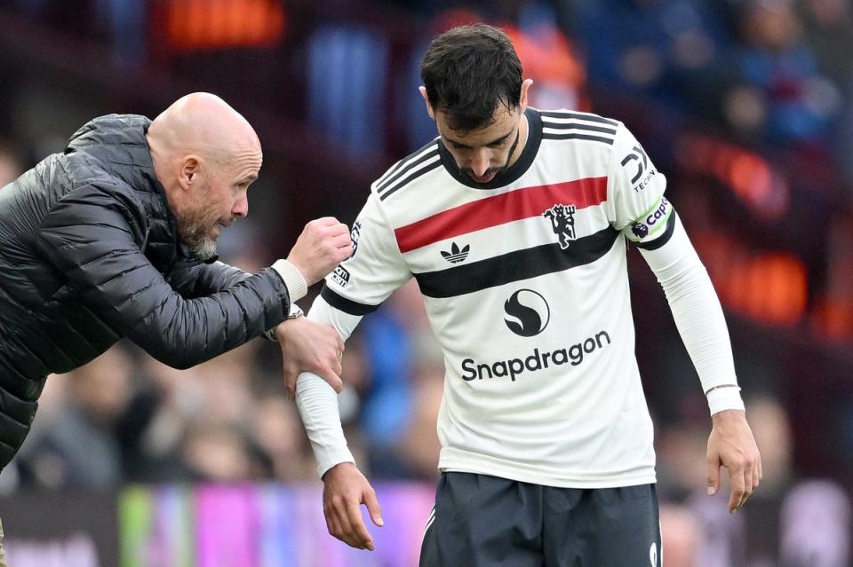 Erik ten Hag gives instructions to Bruno Fernandes during the Premier League match between Aston Villa and Manchester United (Michael Regan/Getty Images)