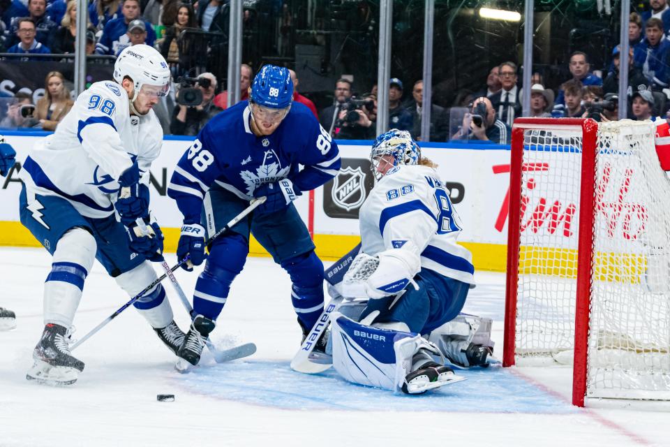 TORONTO, ON - APRIL 27: Toronto Maple Leafs Winger William Nylander (88) skates in front of the net past Tampa Bay Lightning Goalie Andrei Vasilevskiy (88) during the first period of the Round 1 NHL Stanley Cup Playoffs Game 5 between the Tampa Bay Lightning and the Toronto Maple Leafs on April 27, 2023, at Scotiabank Arena in Toronto, ON, Canada.  (Photo by Julian Avram/Icon Sportswire via Getty Images)