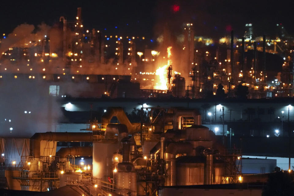 A fire burns after an explosion at the Marathon Refinery in Carson on Tuesday, Feb. 25, 2020. (Scott Varley/The Orange County Register via AP)