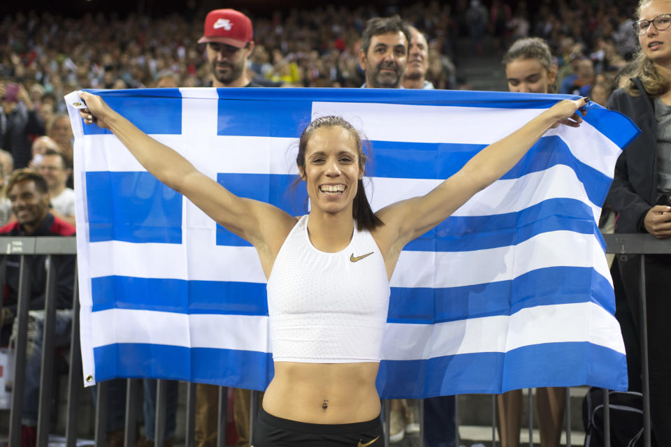 FLE - In this Aug. 30, 2018, file photo, Katerina Stefanidi from Greece celebrates after winning the women's pole vault event during the Weltklasse IAAF Diamond League international athletics meeting at Letzigrund stadium in Zurich, Switzerland. Three of the leading women’s pole vaulters will take their turn to compete in the second edition of the Ultimate Garden Clash. Katerina Stefanidi of Greece, Katie Nageotte of the United States and Alysha Newman of Canada will participate in the event but won’t be competing in their backyards since they don’t have the equipment at home. They will instead be at nearby training facilities. (Ennio Leanza/Keystone via AP, FIle)