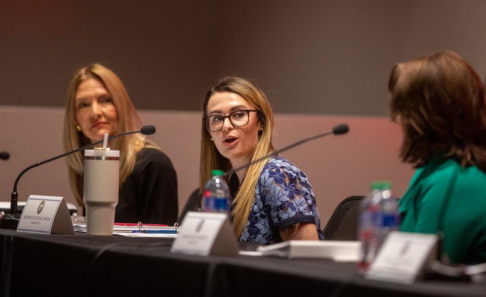 Florida state Rep. Josie Tomkow, center, speaks as Rep. Jennifer Canady, left, and Sen. Colleen Burton listen during Friday's Polk County legislative delegation public meeting at the Polk State College Center for Public Safety in Winter Haven.