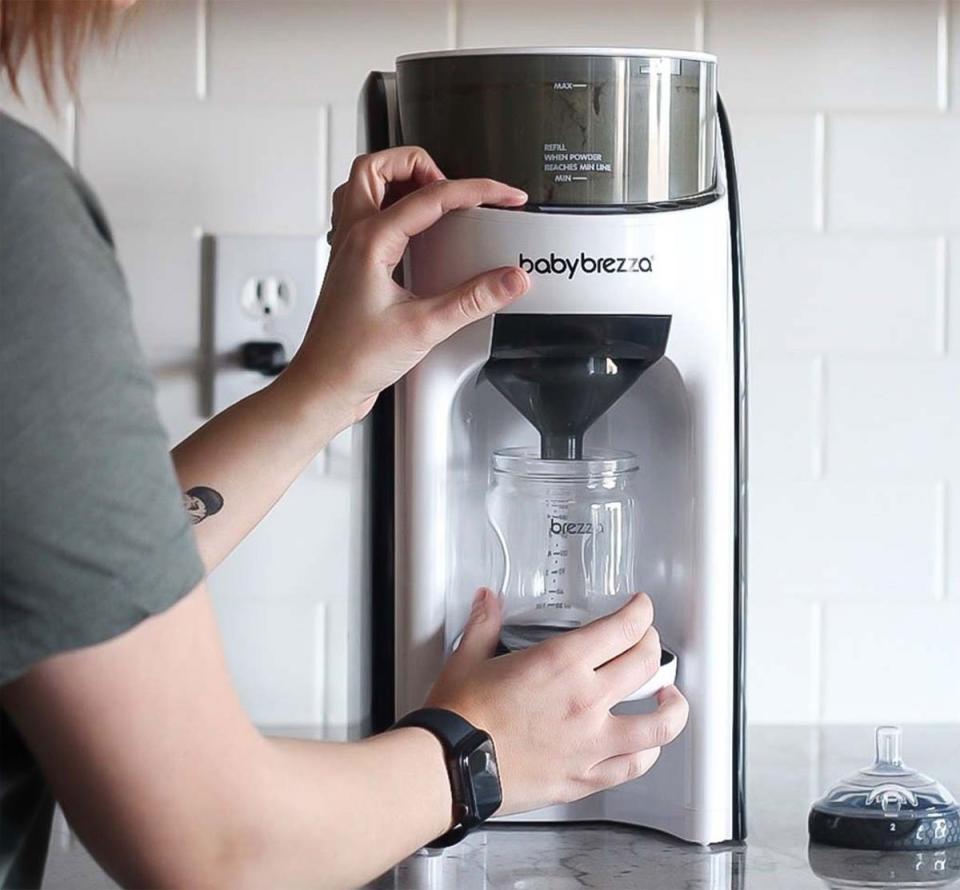 Save yourself time when you need to feed your little one early in the morning or late at night: this machine produces bottles of warm formula on the spot. <br /><br /><strong>Promising review:</strong> "Listen, listen, listen. Without hyperbole, the Baby Brezza has been one of my best investments for year one in babyland. Late-night feeds no longer become about fumbling, spilling, mixing, warming and minutes later delivering a so-so bottle to a crying child. <strong>No, in seconds a measured and warm concoction is in hand and then in baby's mouth.</strong> Just add water to the tank and formula to the dispenser and serve bottles ranging between 2-10 ounces warmed to three different temperatures." &mdash; <a href="https://www.buzzfeed.com/jmihaly" target="_blank" rel="noopener noreferrer">John Mihaly</a> <br /><br /><a href="https://amzn.to/3hPvNDv" target="_blank" rel="noopener noreferrer"><strong>Get it from Amazon for $199.99.</strong></a>