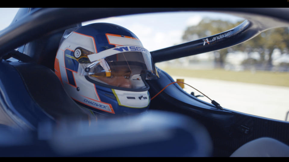 This photo provided by Andretti Autosport shows British racer Jamie Chadwick testing an INDY NXT car on the road course at Indianapolis Motor Speedway, Oct. 21, 2021. She will make her debut in an American series next season driving the No. 28 with sponsorship from DHL and become the first female in 13 years to compete full-time in INDY NXT, the rebranded Indy Lights series. (Andretti Autosport via AP)