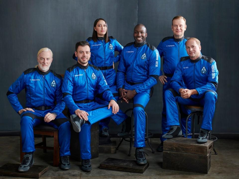 NS-21 crew members, including Hamish Harding, pose for a photo in uniform ahead of Blue Origin's flight to space.